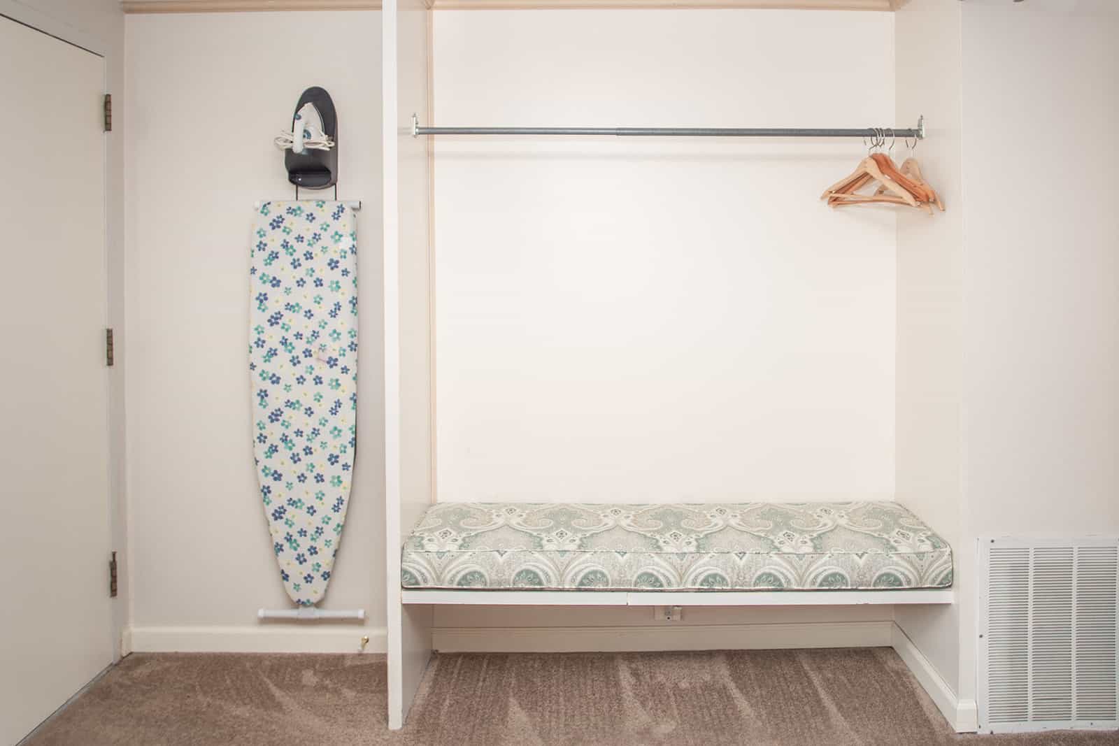 ironing board, clothing rack, and bench 